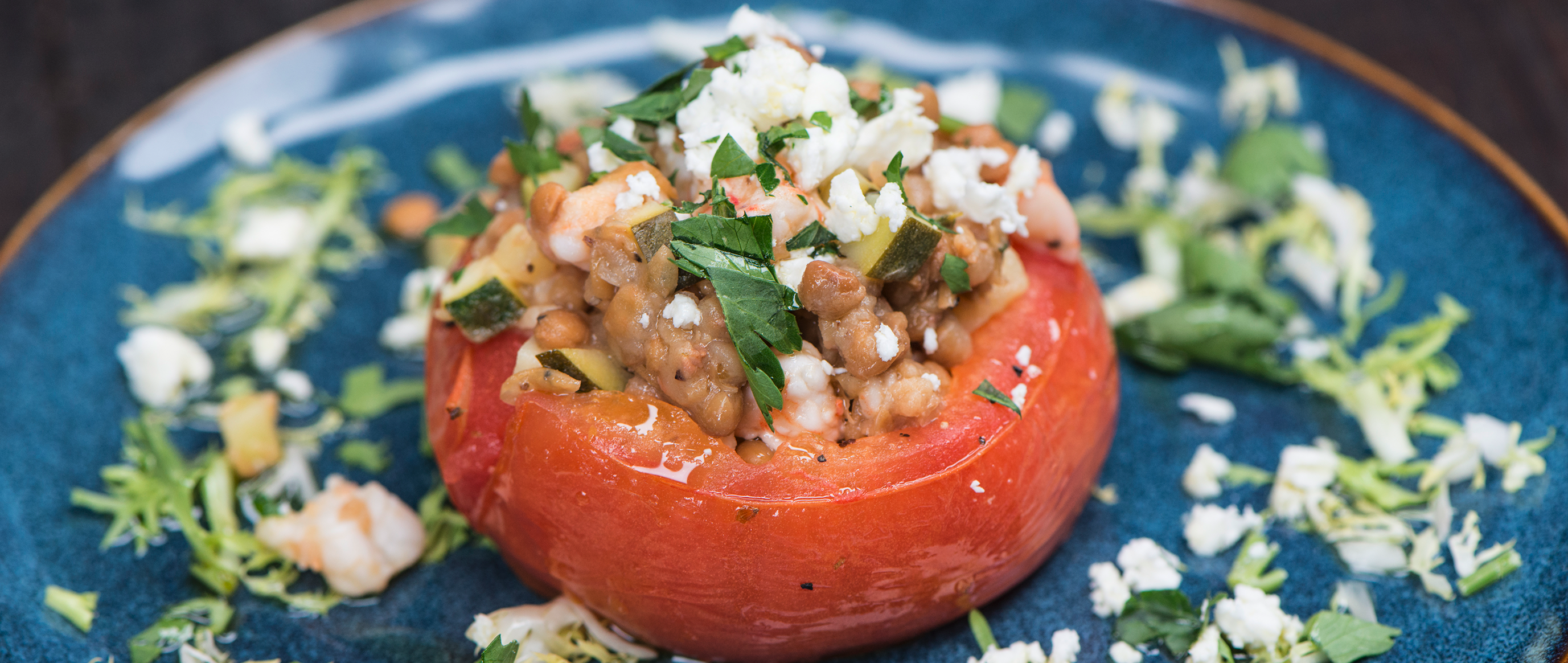 Roasted Stuffed Tomatoes with Lentils, Zucchini and Shrimp