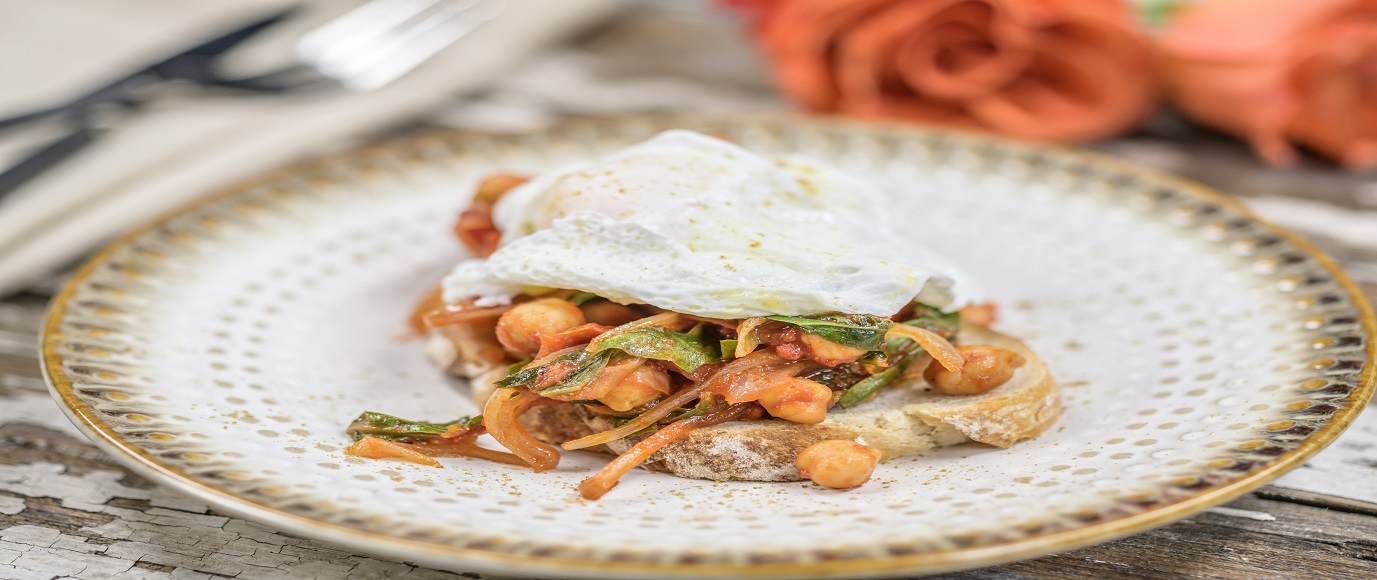 Poached Egg with Chick Peas and Chard over Garlic Toast Poached Egg with Chick Peas and Chard over Garlic Toast