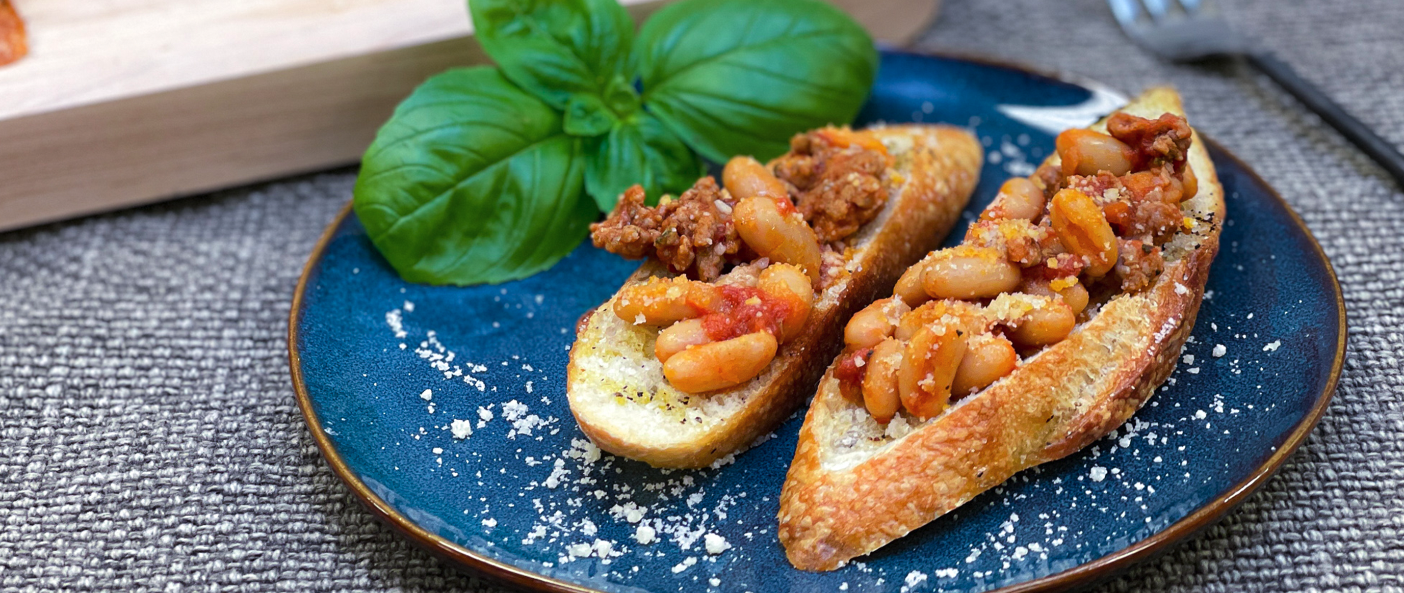 Fagioli All’Ucelletto  (Sausage and Cannellini Bruschetta)